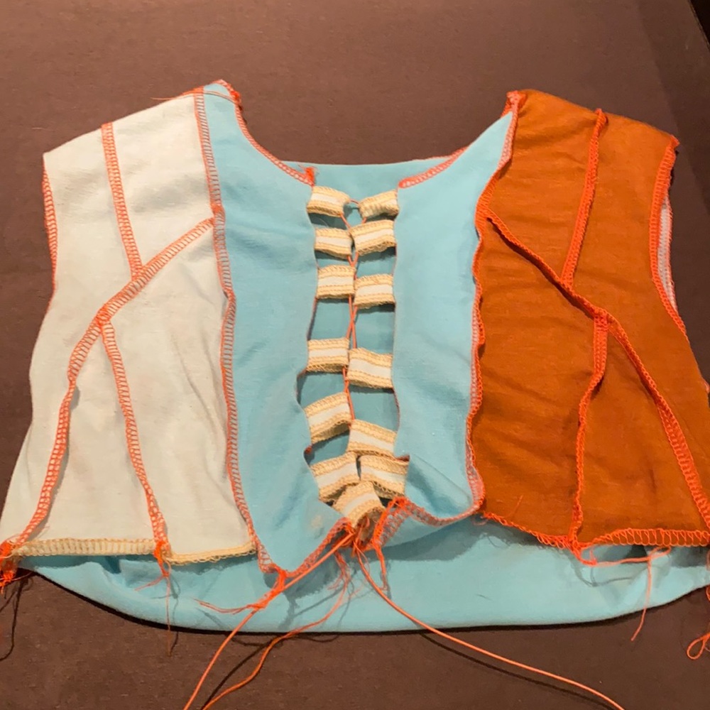Blue and orange Scooby vibes. Chest visual , adjust with strings